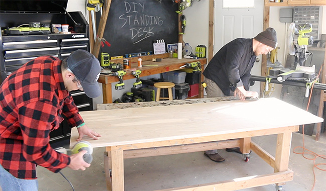 DIY Pete custom standing desk top sanding