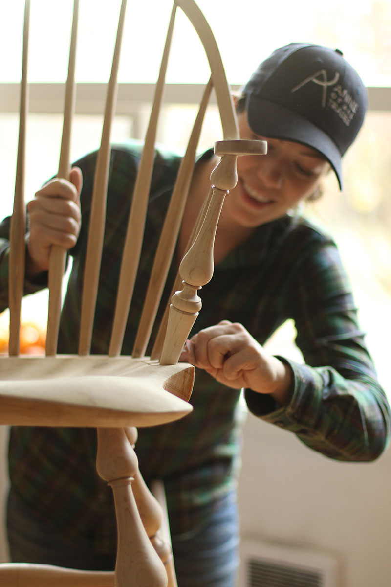Anne of All Trades sanding wood chair