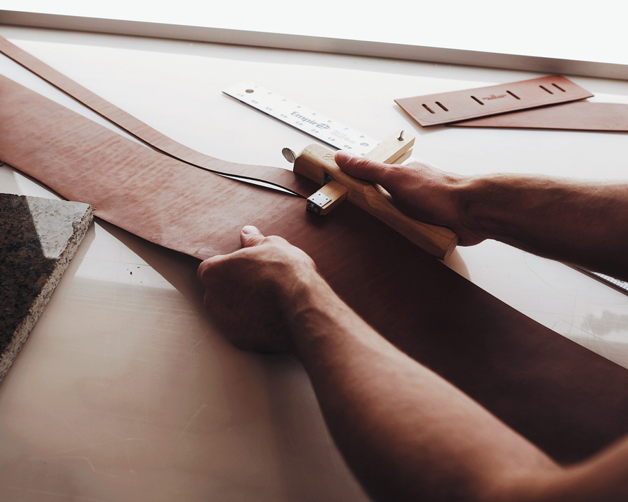 Hand-cutting leather straps - leathercraft by Little King Goods