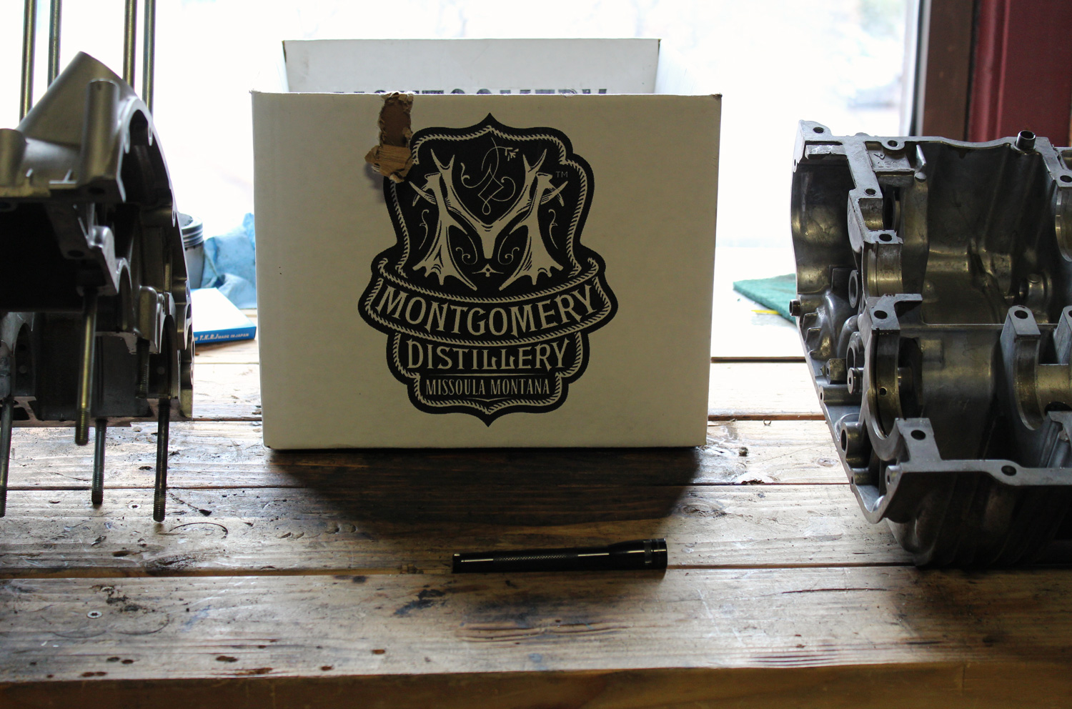 motorcycle shop work bench at Montgomery Distillery